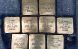 9 Stolpersteine posées au 8-10 rue Eau de Robec, à Rouen, en hommage à la famille Ettinger. (Crédit : Pavés de Mémoire Rouen Métropole)