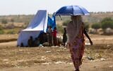 Une Ethiopienne dans le camp de réfugiés de Hamdait à la frontière soudanaise, le 12 novembre 2020. (Crédit : AFP)