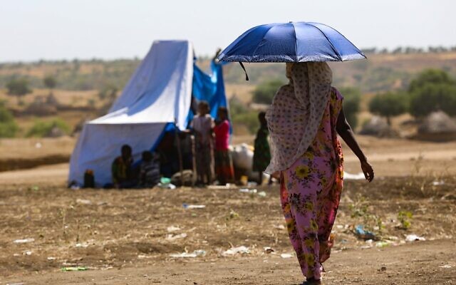 Une Ethiopienne dans le camp de réfugiés de Hamdait à la frontière soudanaise, le 12 novembre 2020. (Crédit : AFP) Une Ethiopienne dans le camp de réfugiés de Hamdait à la frontière soudanaise, le 12 novembre 2020. (Crédit : AFP)