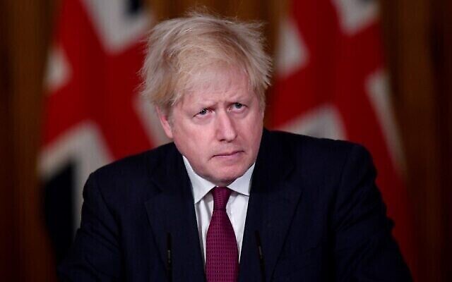 Le Premier ministre britannique Boris Johnson lors d'une conférence de presse virtuelle au 10 Downing Street, dans le centre de Londres, le 19 décembre 2020. (Crédit : TOBY MELVILLE / POOL / AFP) Le Premier ministre britannique Boris Johnson lors d'une conférence de presse virtuelle au 10 Downing Street, dans le centre de Londres, le 19 décembre 2020. (Crédit : TOBY MELVILLE / POOL / AFP)