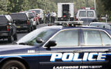 Illustration : Des enquêteurs travaillent sur une scène de crime le 24 septembre 2009 à Lakewood, New Jersey.(Crédit : AP Photo/Mel Evans)