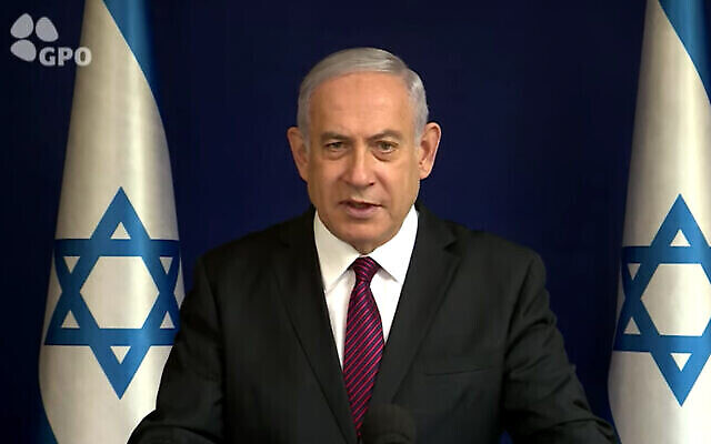 Le Premier ministre Benjamin Netanyahu publie ses vœux de Noël dans une vidéo publiée sur ses comptes de médias sociaux le 23 décembre 2020. (Capture d'écran / YouTube)
