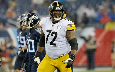 Le tacle offensif des Steelers de Pittsburgh Zach Banner (72) joue contre les Tennessee Titans à Nashville, Tennessee, le 25 août 2019. (AP Photo/Mark Zaleski)