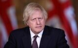 Le Premier ministre britannique Boris Johnson assiste à une conférence de presse virtuelle au 10 Downing Street, dans le centre de Londres, le 8 mars 2021. (HANNAH MCKAY / POOL / AFP)