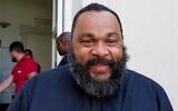 Dieudonné M'Bala M'Bala s'adresse aux médias devant le palais de justice de Chartres, le 22 juin 2020, avant un procès pour propos racistes et antisémites présumés. (Crédit : Guillaume SOUVANT / AFP)