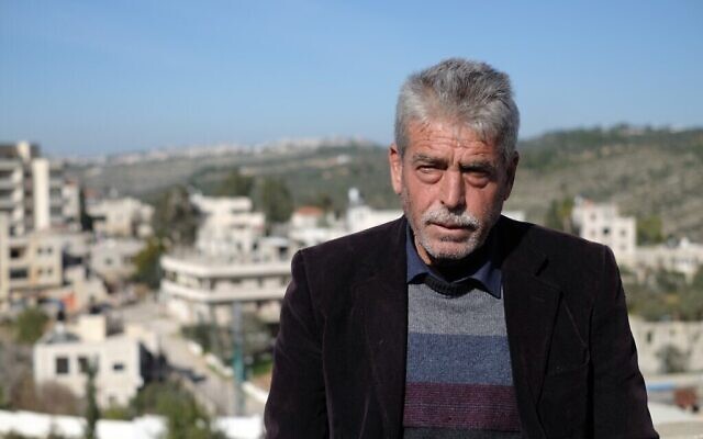 Le père de Khaled Nofal, qui a été tué lors d'une altercation avec des résidents d'implantations israéliens, sur le toit de la maison familiale dans le village de Ras Karkar en Cisjordanie, le 11 février 2021. (Judah Ari Gross/Times of Israel)