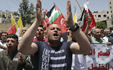 Des partisans palestiniens du mouvement Fatah manifestent dans la ville d'Hébron, en Cisjordanie, le 5 juin 2020. (Hazem Bader/AFP)