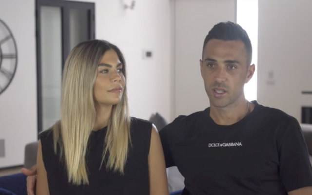 Eran Zahavi et sa femme, Shay, dans une vidéo postée le 9 mai 2021. (Capture d'écran : Douzième chaîne News) Eran Zahavi et sa femme, Shay, dans une vidéo postée le 9 mai 2021. (Capture d'écran : Douzième chaîne News)