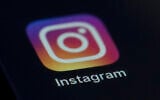 L'application Instagram sur un smartphone, en août 2019. (Crédit : Jenny Kane/AP)