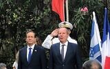 Le président Isaac Herzog (à gauche) et l'ambassadeur de France Eric Danon le 14 juillet 2021, à Jaffa. (Crédit : Lazar Berman/Times of Israel)
