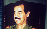 Le président irakien Saddam Hussein, à Bagdad, sur cette photo d'archive datant de janvier 1991. (Crédit : AP Photo)