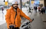 Sayed Sadaat, ancien ministre afghan des communications, pose pour une photo à Leipzig, en Allemagne orientale, le 29 août 2021. (Crédit : JENS SCHLUETER / AFP)