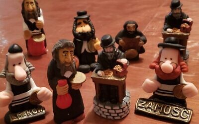 Des figurines 'Lucky Jew Doll' achetées dans les villes polonaises de Cracovie, Varsovie et Zamosc. (Matt Lebovic/The Times of Israel)