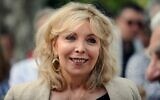 Maryse Wolinski, la veuve du dessinateur français du journal satirique Charlie Hebdo pose après l'inauguration de la médiathèque "Georges Wolinski " à Fenouillet, le 13 juin 2015. (Crédit : REMY GABALDA / AFP)