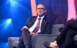 Le ministre des Affaires de la Diaspora, Nachman Shai, s'exprimant lors du sommet national du Israeli American Council, le 11 décembre 2021. (Crédit : Noam Galai)