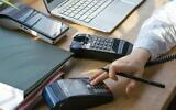 Une photo illustrative du traitement des paiements. (Mikhail Nilov de Pexels)
