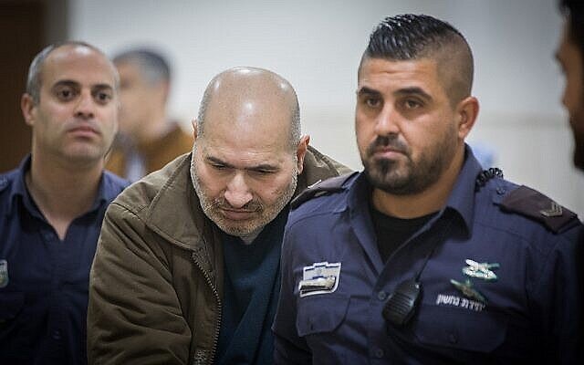 Jamil Tamimi, l'homme palestinien qui a assassiné l'étudiante britannique Hannah Bladon le 14 avril 2017 à Jérusalem, est amené pour une audience au tribunal de district de Jérusalem, le 31 décembre 2018. (Yonatan Sindel/Flash90) Jamil Tamimi, l'homme palestinien qui a assassiné l'étudiante britannique Hannah Bladon le 14 avril 2017 à Jérusalem, est amené pour une audience au tribunal de district de Jérusalem, le 31 décembre 2018. (Yonatan Sindel/Flash90)