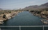 Le Nil coule depuis le Grand Ethiopian Renaissance Dam (GERD) à Guba, en Éthiopie, le 19 février 2022. (Crédit : Amanuel Sileshi/AFP)