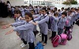 Illustration. Des écolières palestiniennes, le  jour de la rentrée scolaire, dans la ville de Ramallah en Cisjordanie, le 25 août 2013. (Crédit : Issam Rimawi/FLASH90/File)