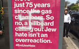 Une croix gammée sur un panneau publicitaire de sensibilisation à l'antisémitisme, à New York, le 5 mai 2022. (Crédit: JewBelong)