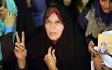 Sur cette photo d'archives du 18 février 2016, Faezeh Hashemi, fille de l'ancien président iranien Akbar Hashemi-Rafsanjani, assiste à un meeting de campagne des réformateurs pour les prochaines élections législatives à la salle Hejab, dans la capitale Téhéran. (Crédit : Atta Kenare/AFP)
