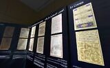Des documents anciens sont exposés sur le mur du département des archives de la Bibliothèque nationale de Tunisie, dans la capitale Tunis, le 26 janvier 2022. (Crédit : Fethi Belaid / AFP)