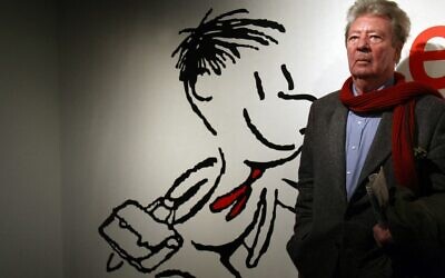 Le dessinateur français du personnage de bande dessinée Le Petit Nicolas ou Le Petit Nicolas Sempe pose lors de la visite d'une exposition à la mairie de Paris commémorant les 50 ans du Petit Nicolas, à Paris, le 5 août 2009. (Crédit : Joël SAGET / AFP)