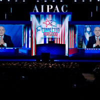 Le Premier ministre Benjamin Netanyahu s’exprime dans une vidéo depuis Israël lors de la conférence politique 2019 de l’American Israel Public Affairs Committee (AIPAC), au Washington Convention Center, à Washington, DC, le 26 mars 2019. (Crédit : Jose Luis Magana/AP)