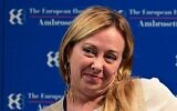 La co-fondatrice et présidente du mouvement Fratelli d'Italia Giorgia Meloni près de Côme, dans le nord de l'Italie, le 4 septembre 2022. (Crédit :  MIGUEL MEDINA / AFP)