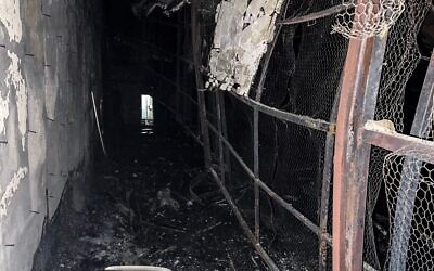 Cette image de l'agence de presse iranienne IRNA montre les dégâts entraînés par un incendie aux abords de la prison d'Evine, au nord-ouest de Téhéran, la capitale iranienne, le 16 octobre 2022. (Crédit : Photo by AFP)