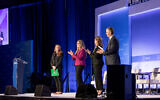 De gauche à droite, les représentants démocrates Melanie Stansbury, Jennifer Wexton, Madeleine Dean et Sean Casten lors de la conférence de J Street à Washington, le 5 décembre 2022. (Crédit : J Street)