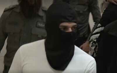 Un agent de la Police des frontières accusé d'avoir tué illégalement un Palestinien handicapé en 2020 est jugé, le 28 février 2023. (Crédit : Capture d'écran de la vidéo/utilisée conformément à la clause 27a de la loi sur les droits d'auteur)