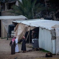 Des Palestiniens dans le village bédouin de Khan al-Ahmar, en Cisjordanie, le 23 janvier 2023. (Crédit : Jamal Awad/Flash90)