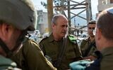 Le général Yehuda Fox en visite sur le site d'une fusillade dans la ville de Huwara, en Cisjordanie, le 26 mars 2023. (Crédit : Armée israélienne)