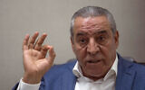 Le secrétaire général du comité exécutif de l'OLP, Hussein al-Cheikh, accordant une interview à l'Associated Press dans son bureau de Ramallah, le 13 juin 2022. (Crédit : Nasser Nasser/AP Photo)