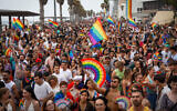 Des personnes participant à la 25ᵉ édition de la Gay Pride de Tel Aviv, le 8 juin 2023. (Crédit : Miriam Alster/Flash90)