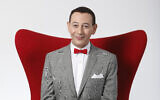L'acteur Paul Reubens, campe le personnage de Pee-wee Herman, le 7 décembre 2009, à Los Angeles, en Californie. (Crédit : AP Photo/Danny Moloshok, File)
