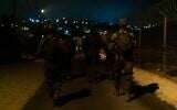 Illustration : Des soldats israéliens interviennent en Cisjordanie, à l'aube du 21 septembre 2023. (Crédit : Armée israélienne)