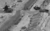 Cette capture d'écran tirée d'une vidéo diffusée par l'armée israélienne montre des chars entrant dans le nord de la bande de Gaza, le 26 octobre 2023. (Crédit : Tsahal / AFP)