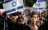 Rassemblement à Genève pour demander la libération des otages capturés par le Hamas, le 22 octobre 2023. (Crédit : Gabriel MONNET / AFP)