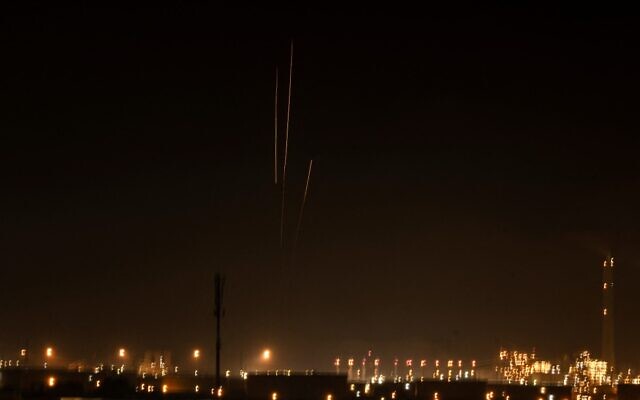 A picture taken from Israel's southern city of Ashkelon shows rockets fired from the Gaza Strip on October 28, 2023, amid ongoing battles between Israel and the Palestinian group Hamas. (Photo by Yuri CORTEZ / AFP)