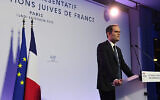 Le président du CRIF, Yonathan Arfi, prononce un discours lors du 37e dîner annuel du Conseil représentatif des institutions juives de France (CRIF) à Paris, le 13 février 2023. (Crédit : Alain JOCARD/AFP)