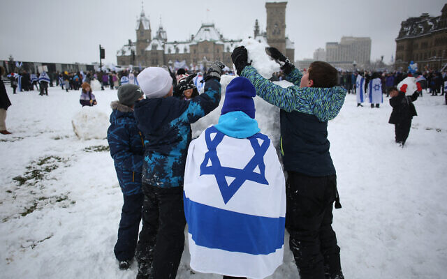 Manifestation en soutien à Israël à Ottawa, au Canada, le 4 décembre 2023. (Crédit : Dave Chan / AFP) Manifestation en soutien à Israël à Ottawa, au Canada, le 4 décembre 2023. (Crédit : Dave Chan / AFP)