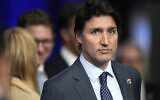 Le Premier ministre canadien Justin Trudeau lors d'une réunion du Conseil de l'Atlantique Nord avec les pays partenaires au sommet de l'OTAN, à Vilnius, en Lituanie, le 12 juillet 2023. (Crédit : Pavel Golovkin/AP Photo)