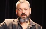 Le dessinateur Joann Sfar à la conférence « En l’absence de Pascin », au musée d'art et d'histoire du judaïsme, à Paris, le 8 février 2024. (Crédit : Rachel A. Silberman)