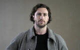 L'acteur Aaron Taylor-Johnson assistant à la présentation de la collection automne-hiver 2024-25 de Giorgio Armani, à Milan, en Italie, le 25 février 2024. (Crédit : Luca Bruno/AP Photo)