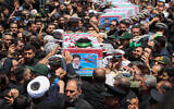 Des soldats portant le cercueil du président iranien Ebrahim Raïssi et d'autres personnes, dans la ville orientale de Birjand, le 23 mai 2024. (Crédit : Présidence iranienne/AFP)