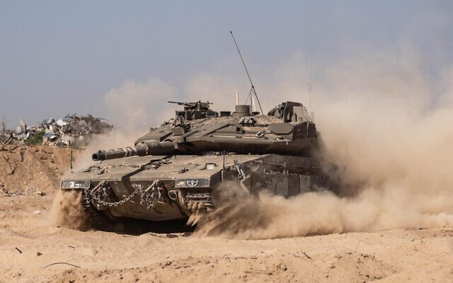 Des troupes de l’armée israélienne en opération dans la bande de Gaza, sur une photo autorisée à la publication le 11 juin 2024. (Crédit : Armée israélienne) Des troupes de l’armée israélienne en opération dans la bande de Gaza, sur une photo autorisée à la publication le 11 juin 2024. (Crédit : Armée israélienne)