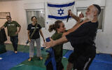 Des participants s'entraînent au Krav Maga à Ma'ale Adumim, le 26 juin 2024. (Menahem Kahana/AFP)