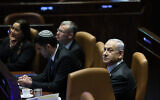 Le Premier ministre Benjamin Netanyahu et des ministres en séance plénière de la Knesset à Jérusalem, le 17 juillet 2024. (Crédit : Yonatan Sindel/Flash90)